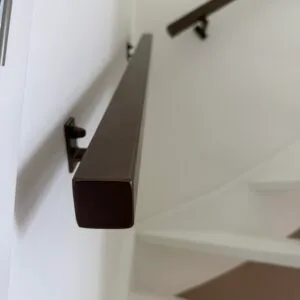 Bronzen trapleuningen