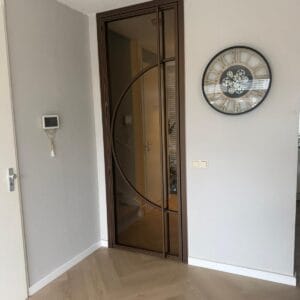 Bronzen deur met brons glas in bestaand kozijn