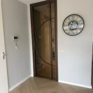 Bronzen deur met brons glas in bestaand kozijn
